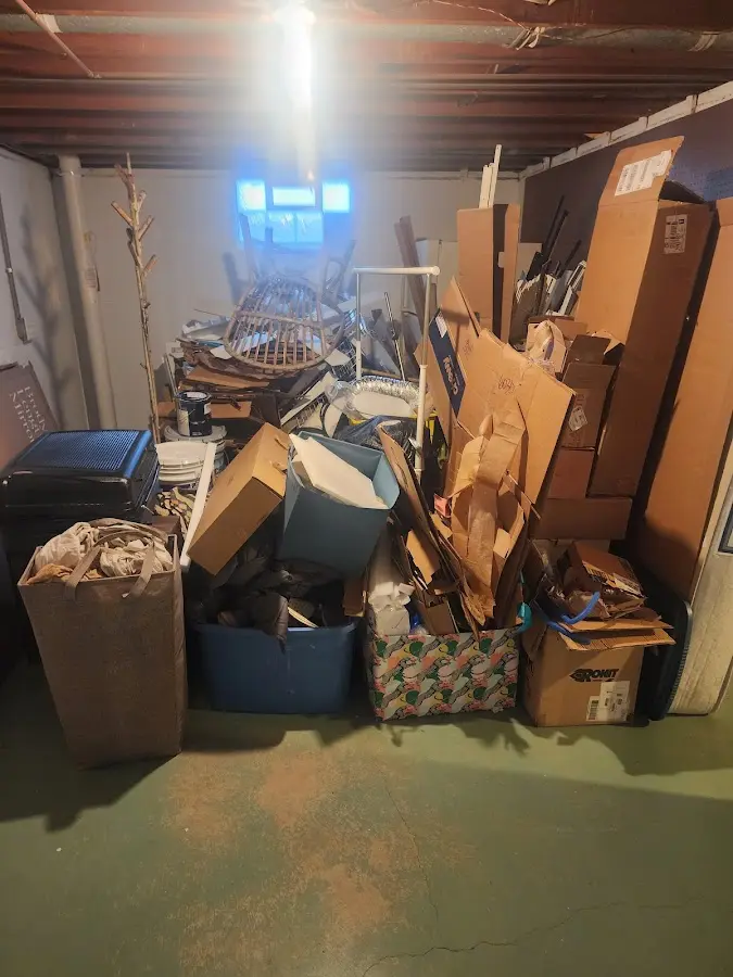 Roll-off dumpster container at job site for 6 Yard Dumpster Rental in Fruita